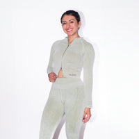 Woman wearing MAMMA MIA zip long sleeve top GUGA, front view, athletic design with zipper