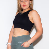 CLASSIC sports bra on model, side view, comfortable athletic fit