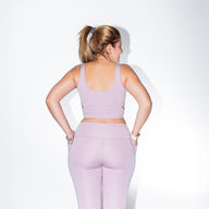 Woman in COMFTY high waisted leggings GUGA, back view, flattering cut
