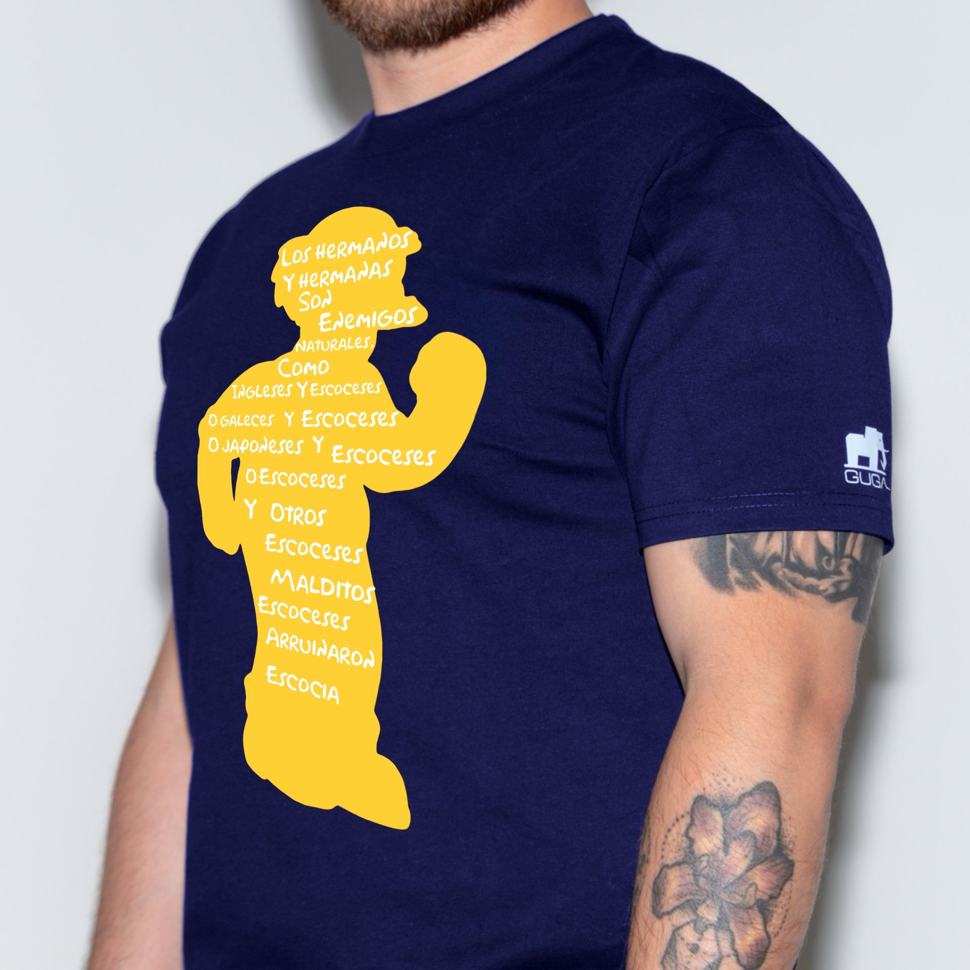 A person wearing a blue navy t-shirt with a Simpsons design 